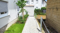 Großzügige 4,5-Zimmer-Erdgeschosswohnung mit schöner Terrasse und Gartenanteil! Erstbezug ab sofort! - Bild